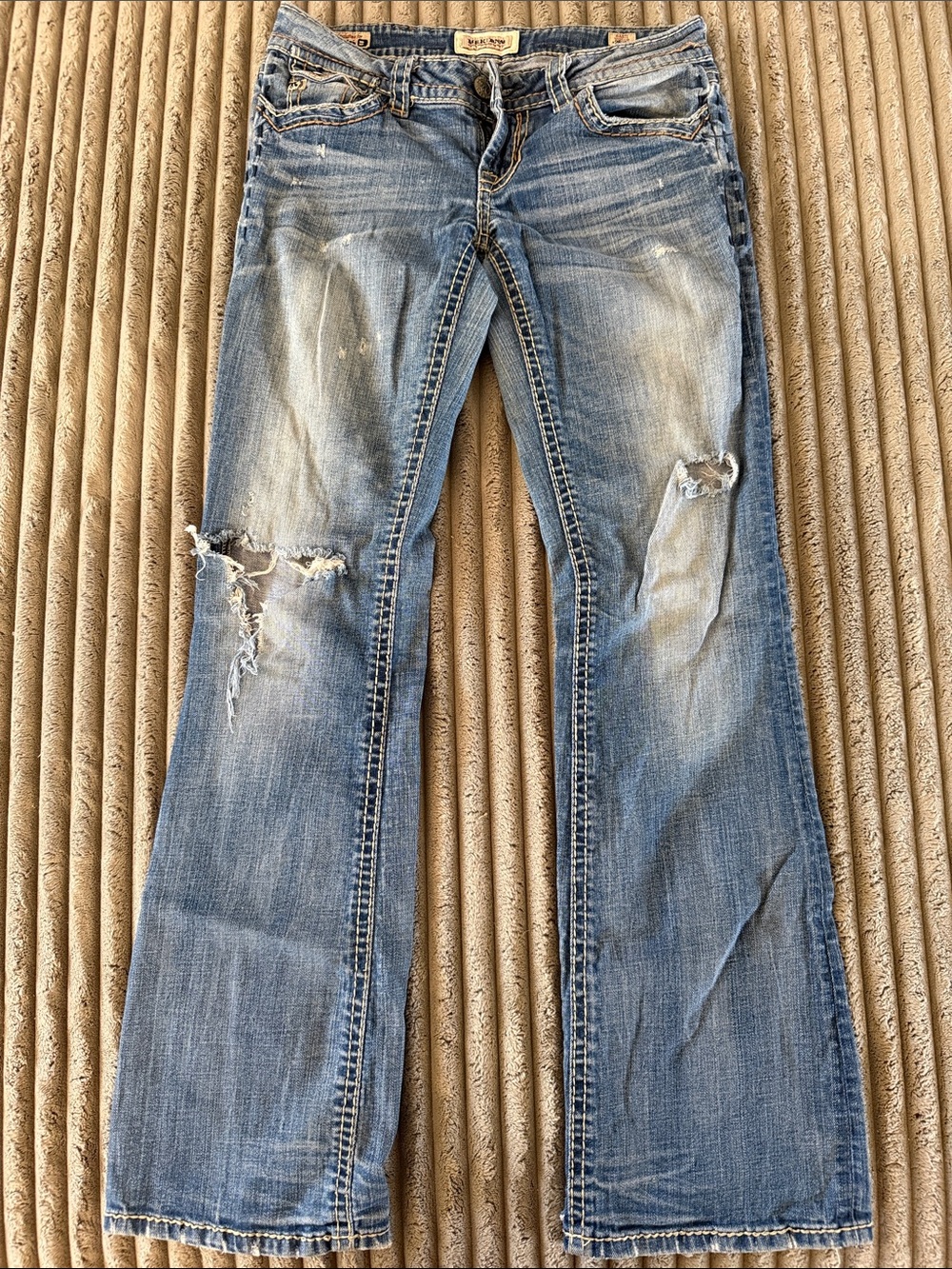 Women's Light Blue Distressed Flare Jeans